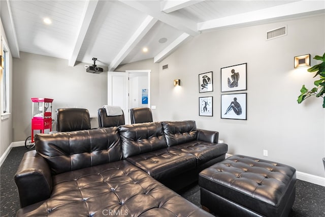 cinema room featuring lofted ceiling with beams, baseboards, visible vents, and carpet floors