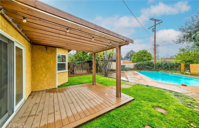 exterior space with a fenced in pool, a wooden deck, a yard, a fenced backyard, and a pergola