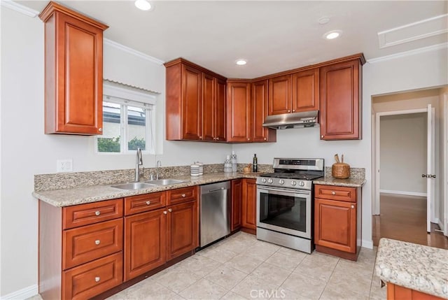 kitchen with under cabinet range hood, ornamental molding, recessed lighting, appliances with stainless steel finishes, and a sink