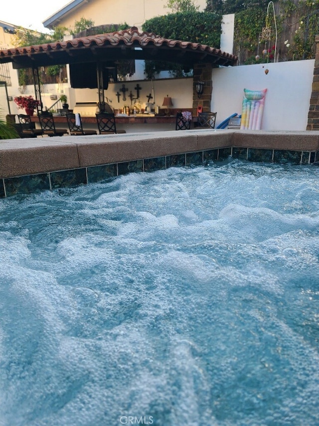 view of swimming pool with an outdoor living space