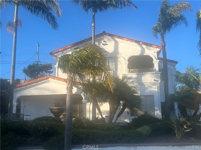 view of home's exterior featuring a garage and stucco siding