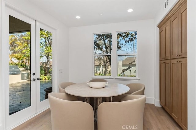 15 Cavaillon, Newport Coast, CA 92657 - dining room featuring light wood-type flooring, french doors, and recessed lighting