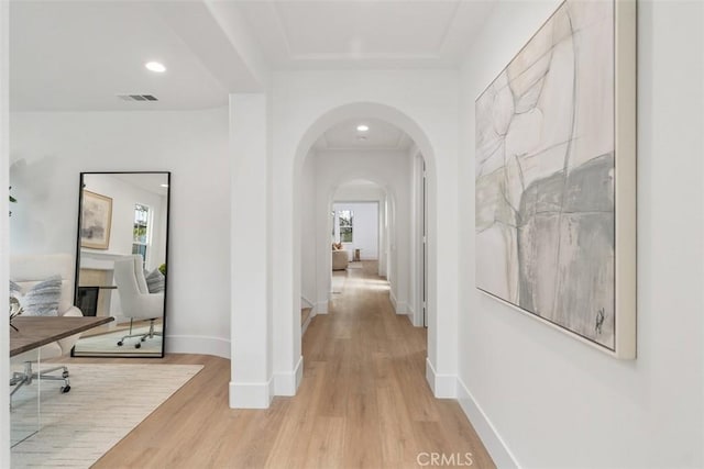 15 Cavaillon, Newport Coast, CA 92657 - corridor featuring arched walkways, light wood-style flooring, and recessed lighting