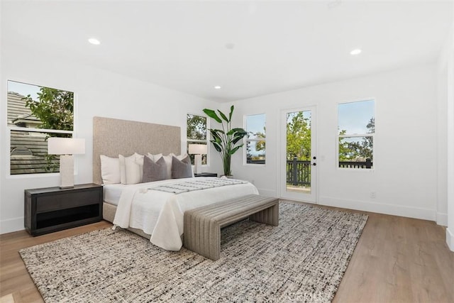 15 Cavaillon, Newport Coast, CA 92657 - bedroom featuring access to outside, light wood-style flooring, and recessed lighting