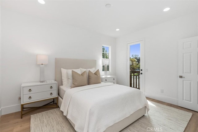 15 Cavaillon, Newport Coast, CA 92657 - bedroom with access to exterior, light wood-style flooring, and recessed lighting