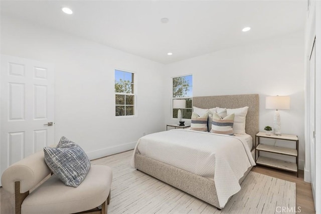 15 Cavaillon, Newport Coast, CA 92657 - bedroom with light wood-style floors and recessed lighting