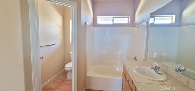 bathroom with toilet, a tub to relax in, tile patterned flooring, walk in shower, and vanity