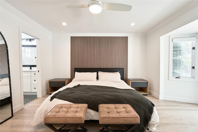 bedroom featuring crown molding, baseboards, ceiling fan, recessed lighting, and light wood-style floors