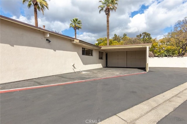 exterior space with stucco siding