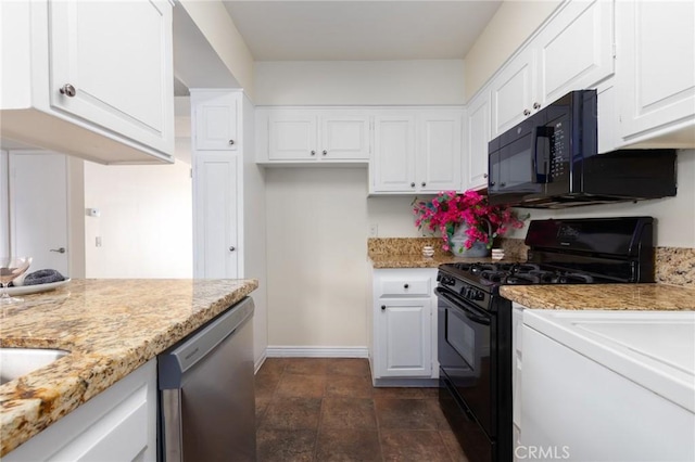 kitchen featuring light stone counters, white cabinetry, black appliances, and baseboards