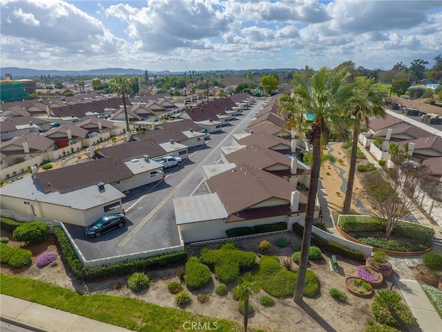 birds eye view of property with a residential view