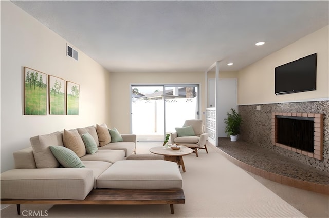 living area with visible vents, a brick fireplace, recessed lighting, and carpet flooring