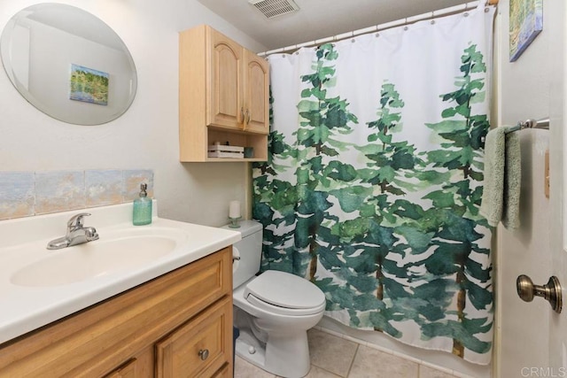 bathroom featuring vanity, a shower with shower curtain, visible vents, tile patterned flooring, and toilet