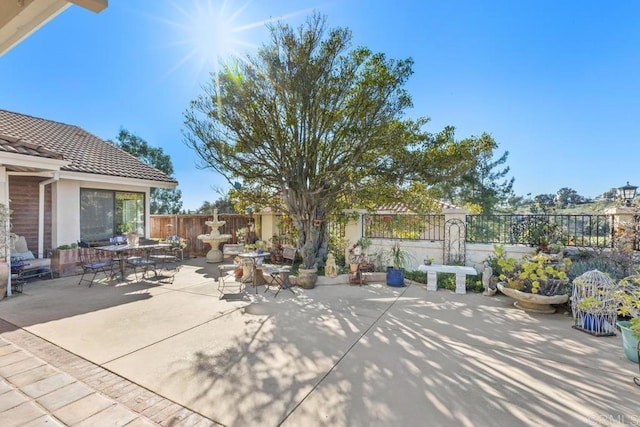 view of patio / terrace featuring fence private yard