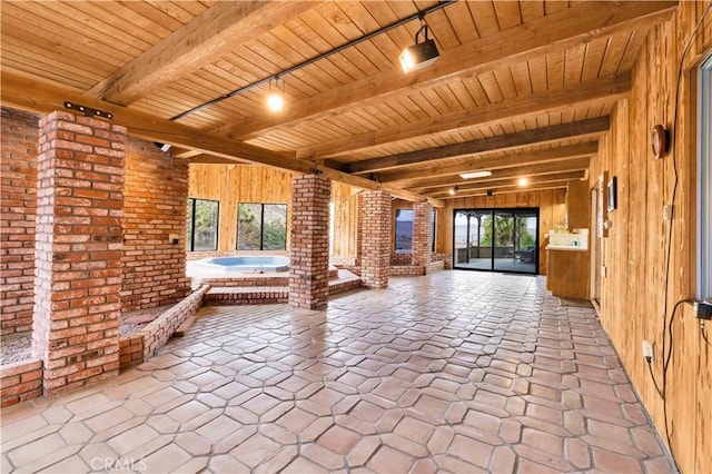 view of patio / terrace featuring an indoor hot tub