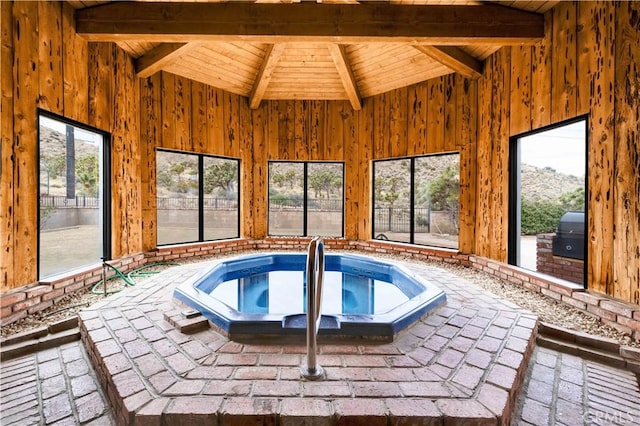 view of swimming pool featuring an indoor in ground hot tub