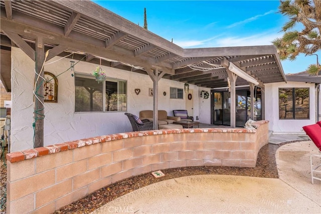 view of patio / terrace featuring a pergola