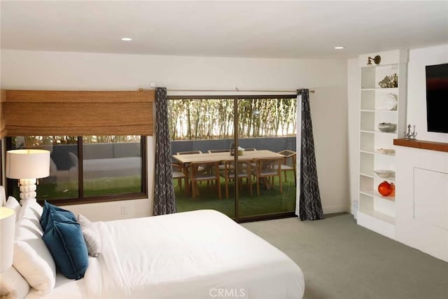 bedroom with recessed lighting and carpet floors