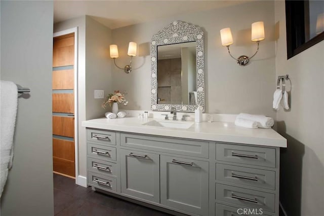 bathroom featuring tile patterned floors and vanity