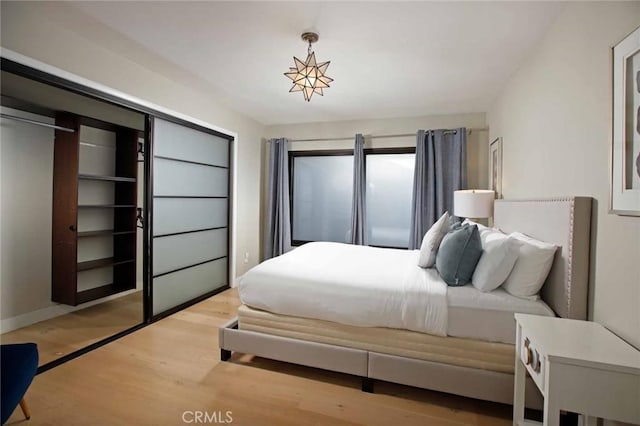 bedroom featuring wood finished floors