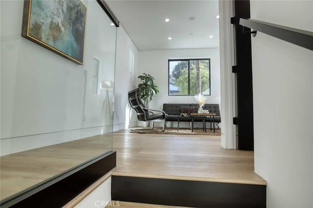 interior space featuring recessed lighting and wood finished floors