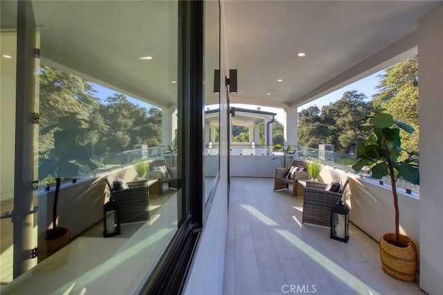 view of patio / terrace with a balcony