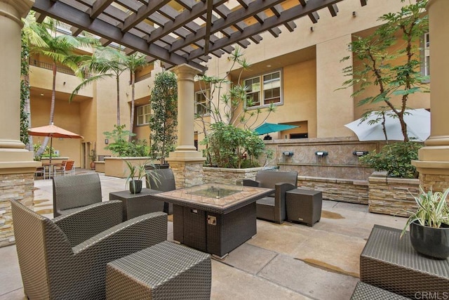 view of patio / terrace with outdoor lounge area and a pergola