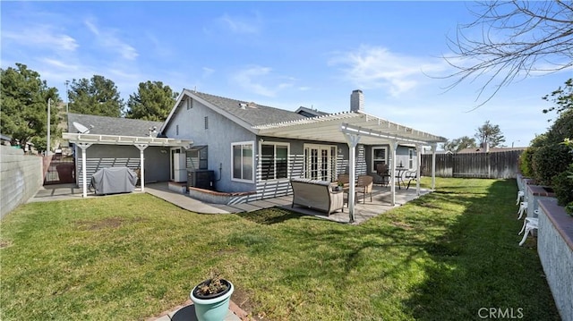 back of house with a lawn, a pergola, a patio, a fenced backyard, and central AC unit