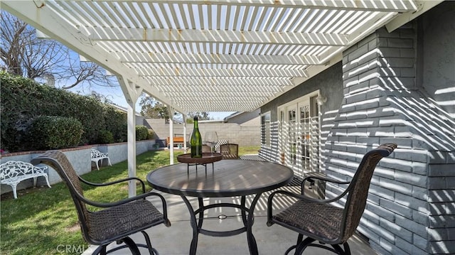 view of patio / terrace with a fenced backyard and a pergola