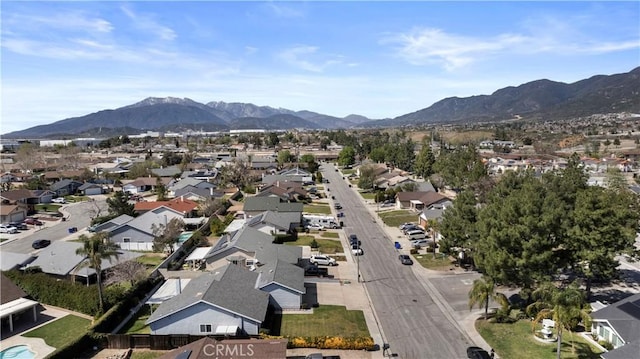 drone / aerial view featuring a mountain view and a residential view