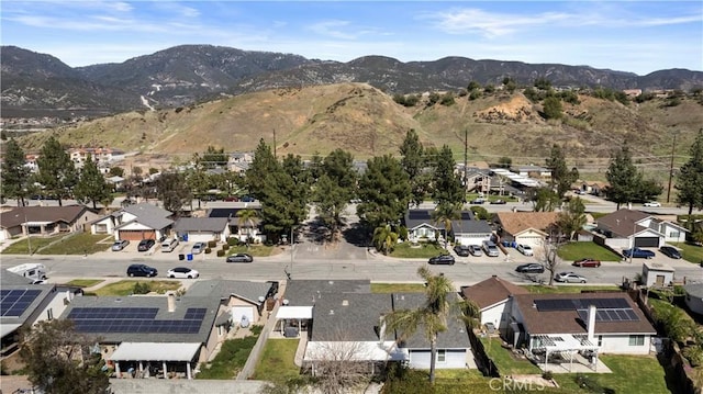 bird's eye view featuring a mountain view and a residential view