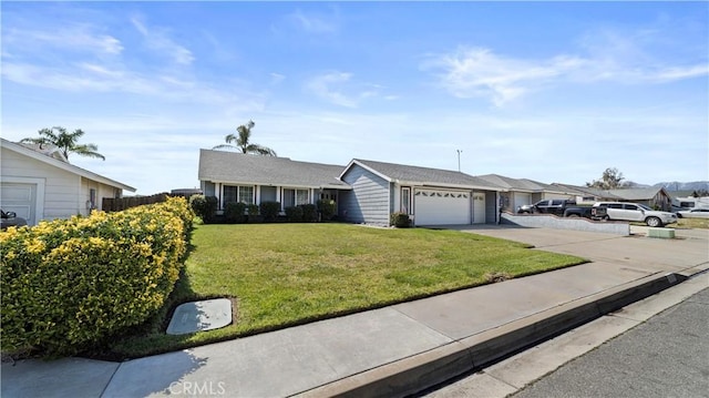 single story home with a garage, driveway, and a front lawn