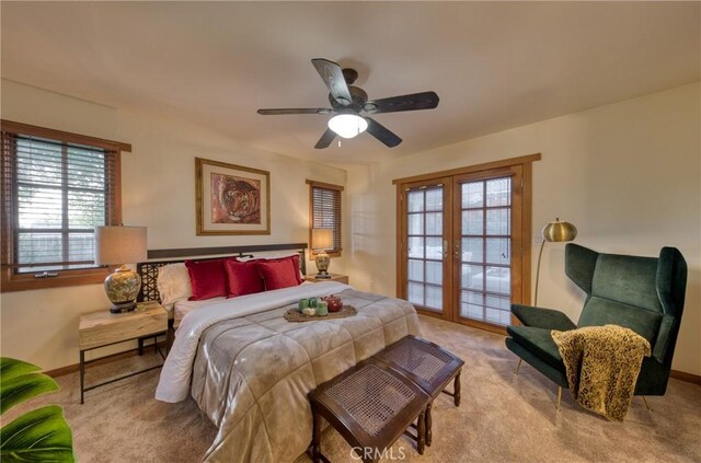 carpeted bedroom with access to outside, french doors, baseboards, and ceiling fan