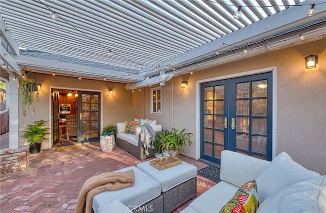 view of patio with french doors, a pergola, and an outdoor hangout area