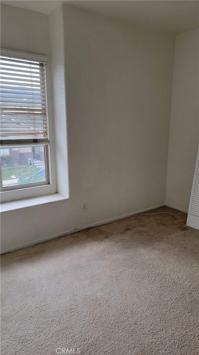 view of carpeted spare room