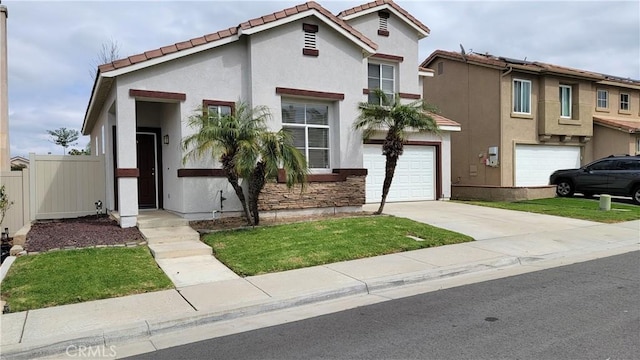 mediterranean / spanish house featuring fence, driveway, stucco siding, a garage, and a tile roof