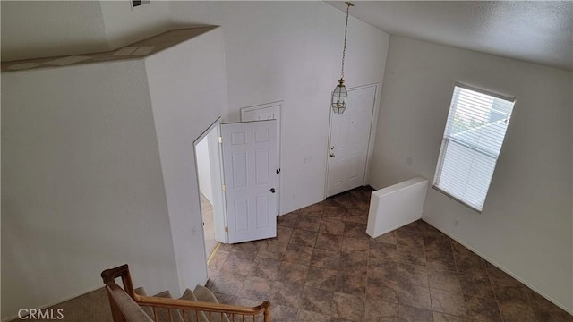 entrance foyer with lofted ceiling