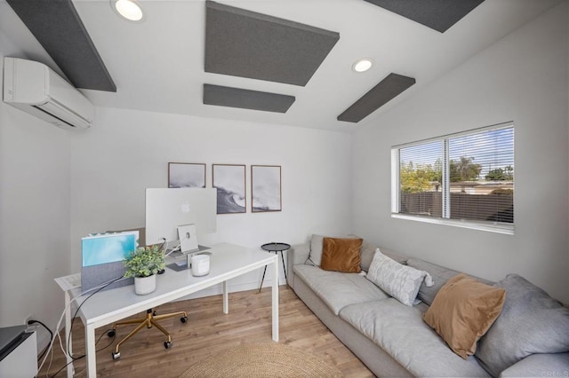 office with wood finished floors, baseboards, a wall mounted AC, recessed lighting, and vaulted ceiling