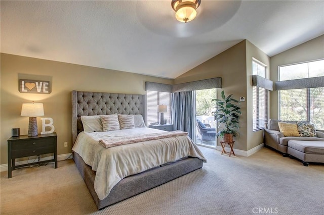 bedroom with baseboards, lofted ceiling, carpet flooring, and access to outside