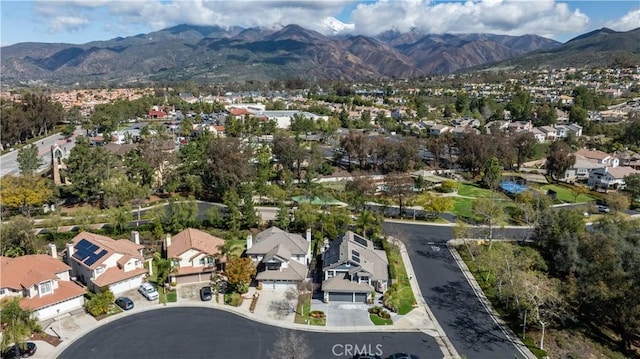 bird's eye view with a residential view and a mountain view