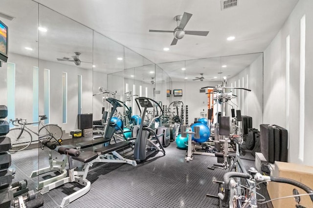 exercise room with recessed lighting, visible vents, and ceiling fan