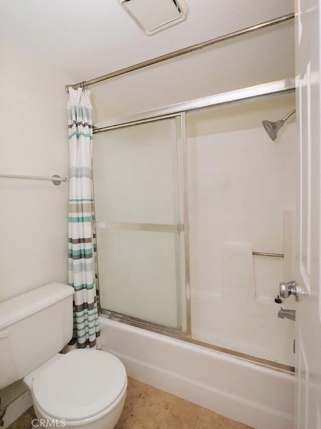 bathroom featuring tile patterned flooring, toilet, and shower / tub combo with curtain