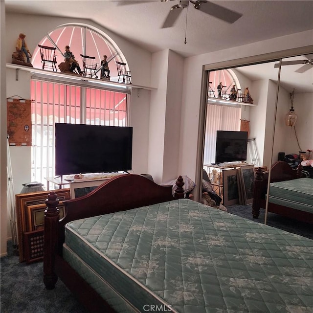 bedroom featuring a closet and carpet flooring