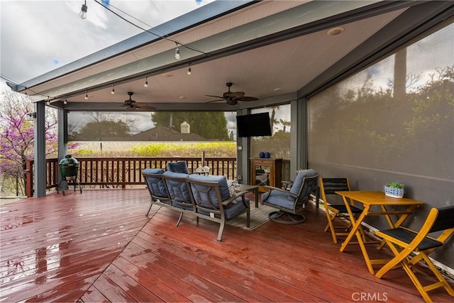 deck with a ceiling fan