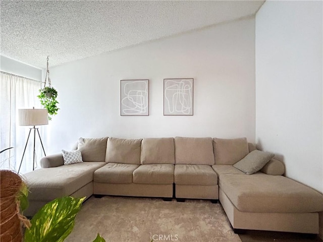 living room with light carpet, a textured ceiling, and vaulted ceiling