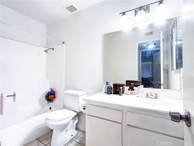 bathroom featuring tile patterned flooring, visible vents, toilet, and vanity