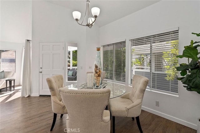 259 Chesterfield, Newport Beach, CA 92660 - dining space with a chandelier, baseboards, high vaulted ceiling, wood finished floors, and healthy amount of natural light