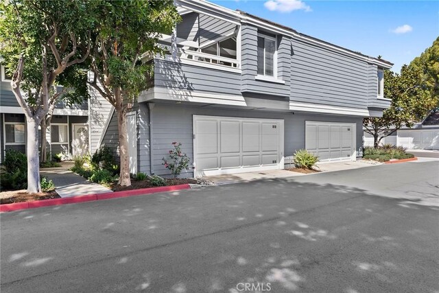 259 Chesterfield, Newport Beach, CA 92660 - view of side of home with an attached garage