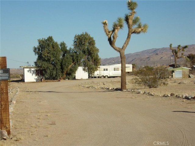 exterior space featuring a mountain view