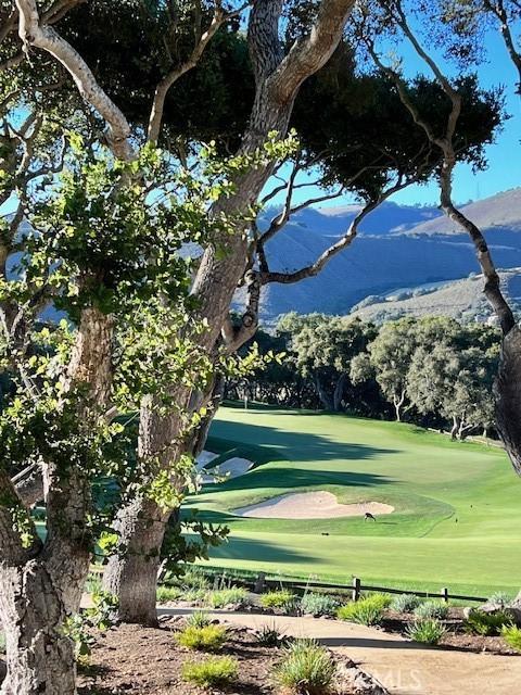 view of property's community with view of golf course